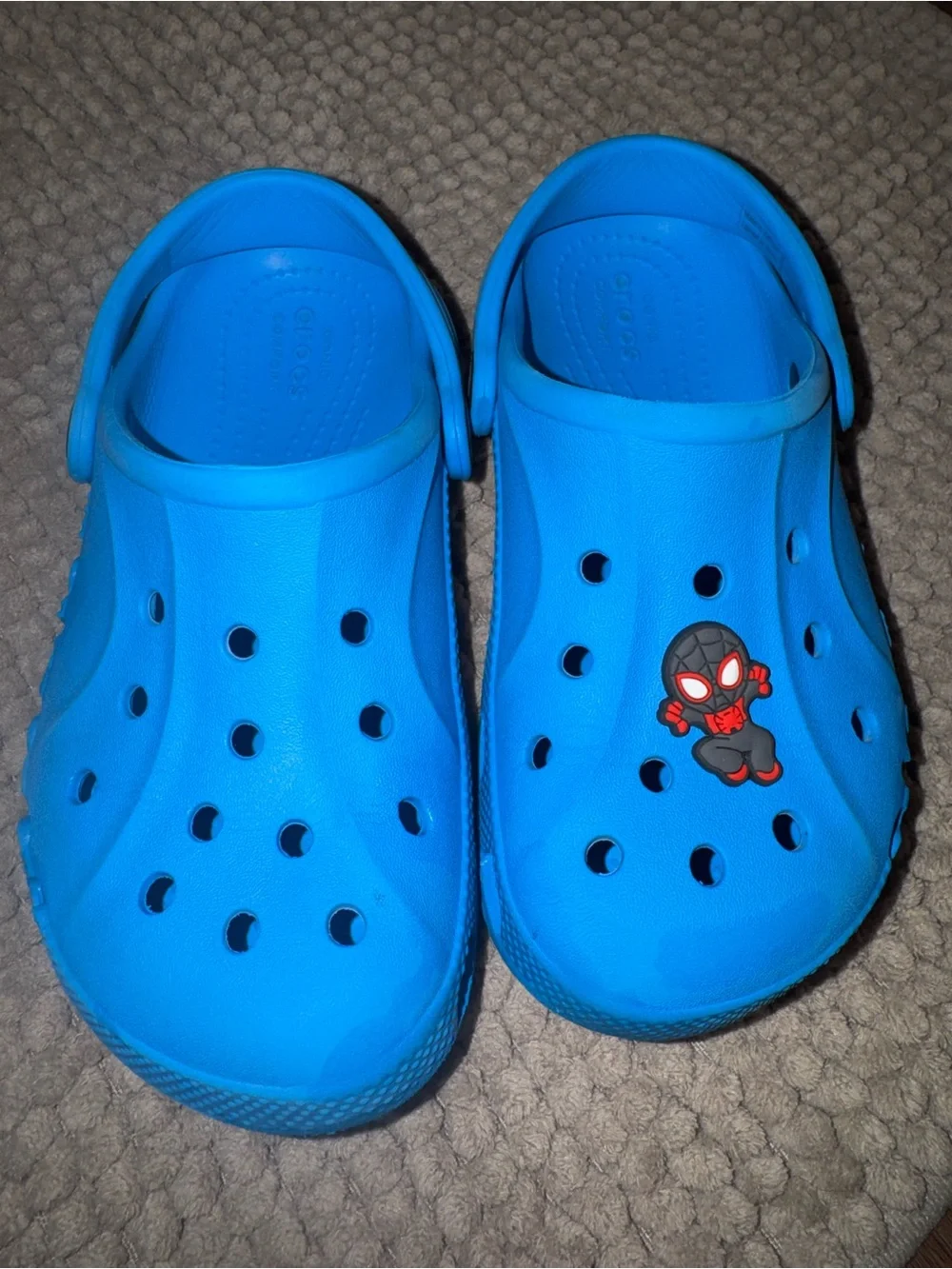 CROCS Kids Bright Blue Clog Sandals with Spider Hero Charm
